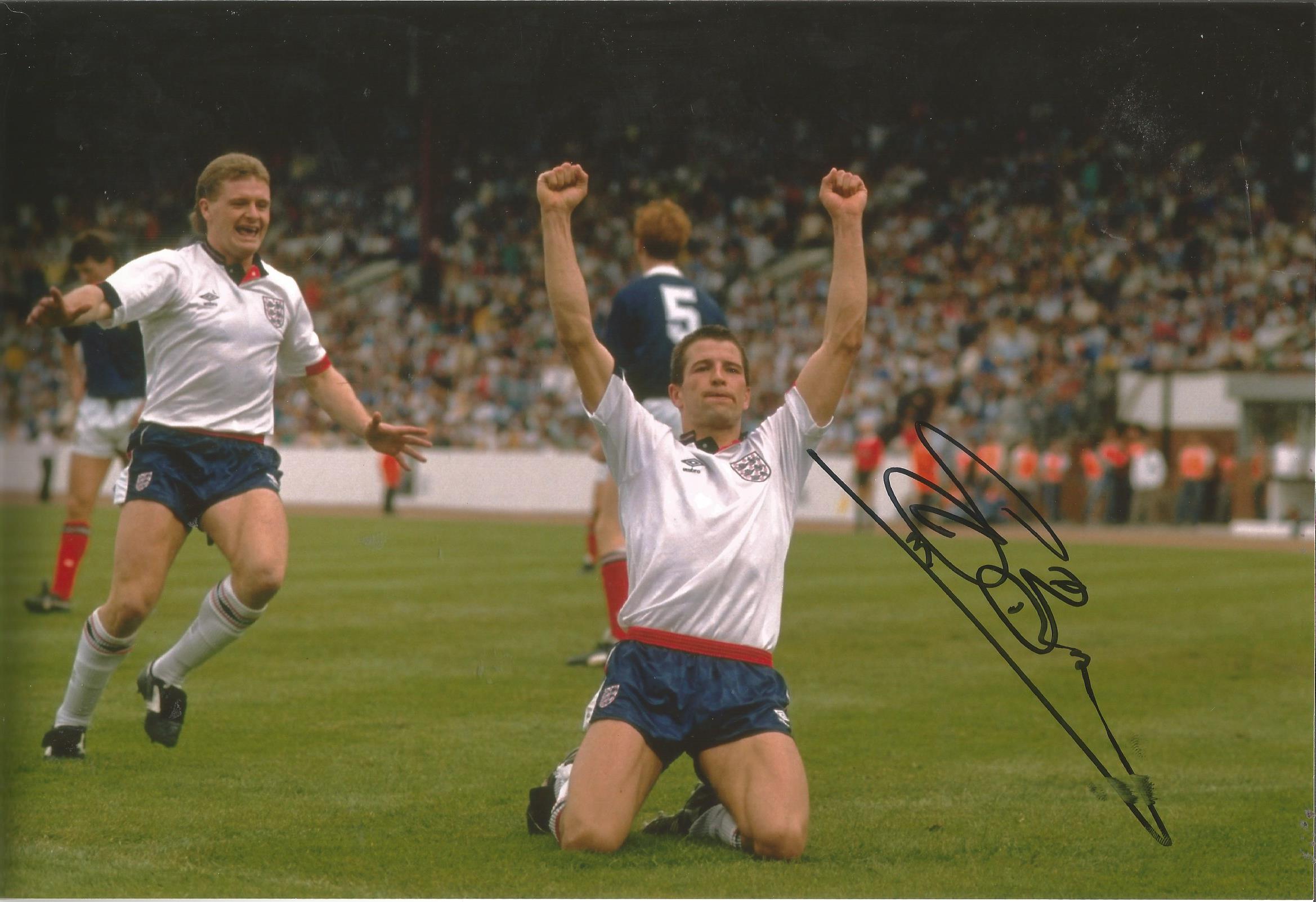 Autographed STEVE BULL photo, a superb image depicting the England striker dropping to his knees