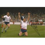 Autographed STEVE BULL photo, a superb image depicting the England striker dropping to his knees