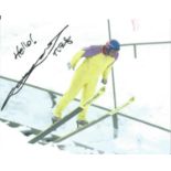 Eddie The Eagle Edwards signed 8x10 photo pictured in action. Good Condition. All signed pieces come