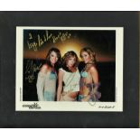 Atomic Kitten original line up signed colour photo. Framed and mounted to approx 14x12. Dedicated.