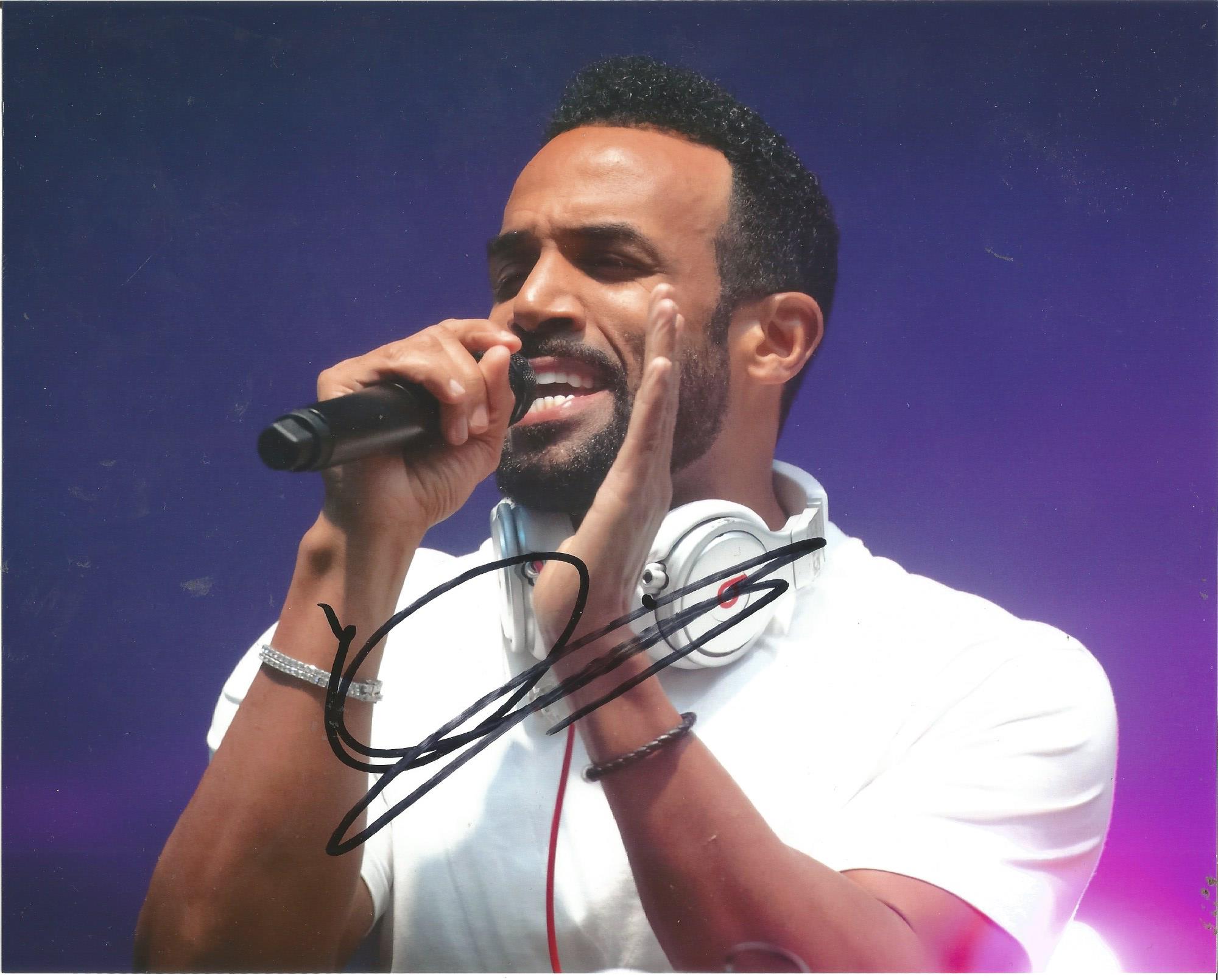 Craig David Singer Signed 8x10 Photo. Good Condition. All signed pieces come with a Certificate of