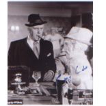 Minder George Cole. A 10"x8" signed photo in character. Good Condition. All signed pieces come