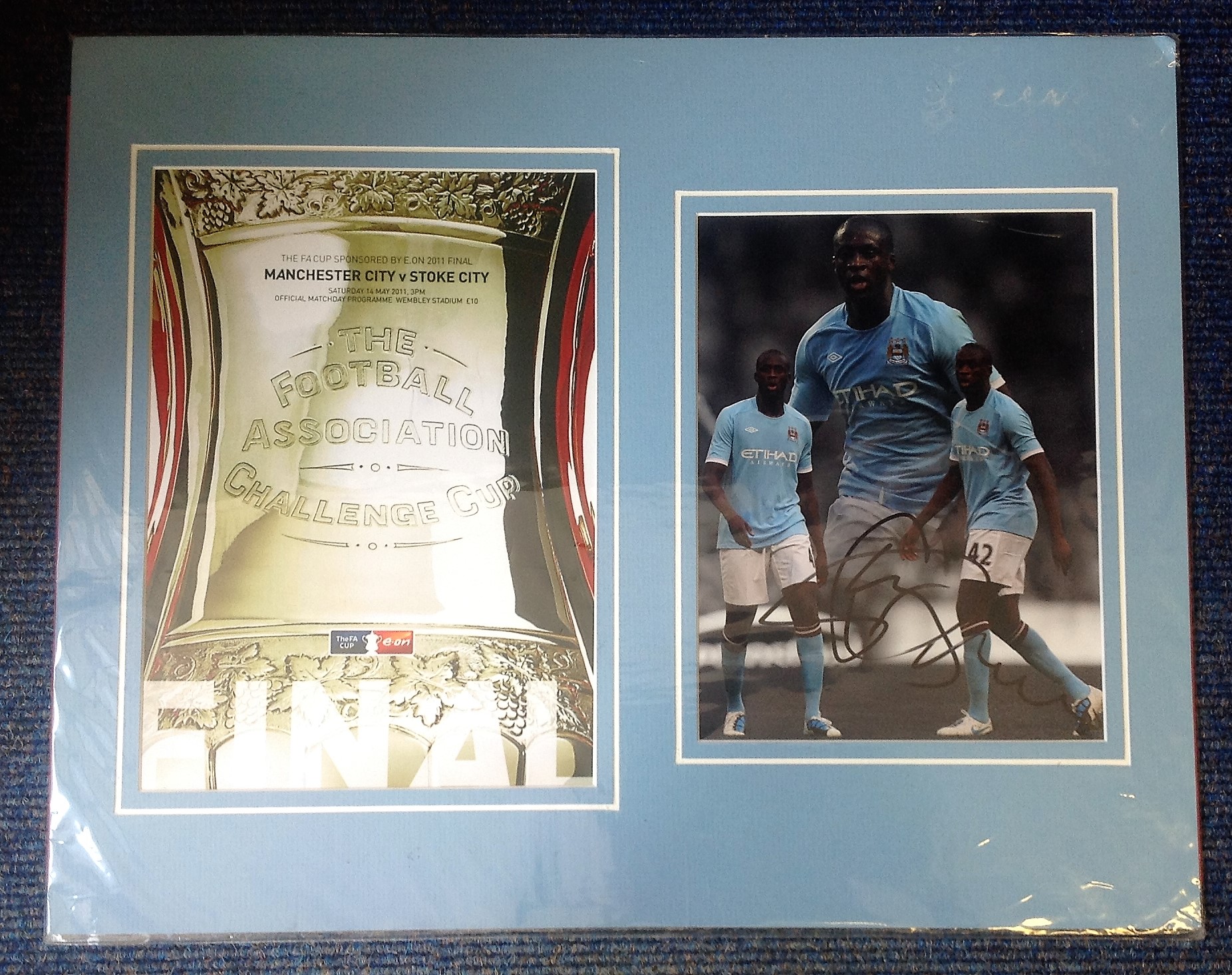 Yaya Toure signed colour Man City photo mounted alongside cover of the 2011 FA cup programme. Approx