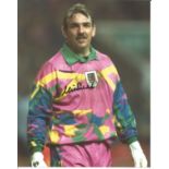 Neville Southall signed 10x8 colour photo pictured playing for Wales. Good Condition. All signed