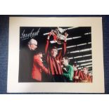 Tony Book signed colour photo with the FA cup for Man City. Mounted to approx size 20x16. Good