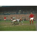 Autographed JOHN TUDOR photo, a superb image depicting Tudor scoring with a brilliant diving