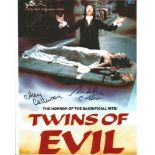 Twins of Evil Collinson twins hand signed 10x8 photo. This beautiful hand signed photo depicts the