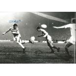 Autographed JOHN HUGHES photo, a superb image depicting Hughes scoring the equalizing goal for