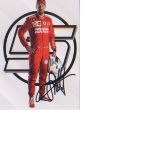 Sebastian Vettel P/C sized signed photo. Good Condition. All signed pieces come with a Certificate