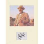 David Suchet Poirot. Signature mounted with 10x8 picture in character. Professionally mounted to