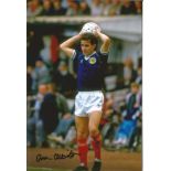 Arthur Albiston signed 12x8 colour photo pictured in action for Scotland. Good Condition. All signed