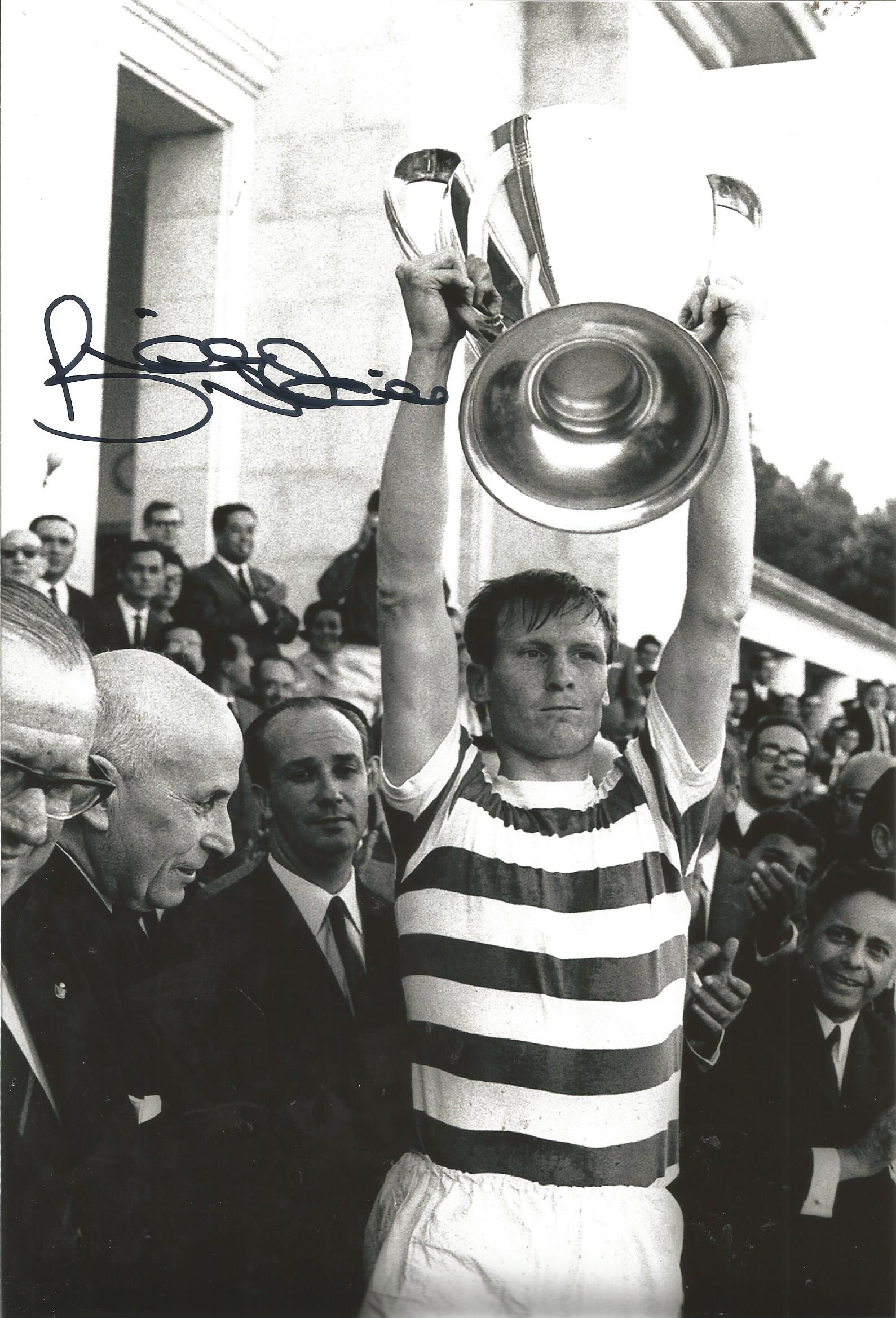 Autographed BILLY McNEILL photo, a superb image depicting the Celtic captain holding aloft the