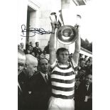 Autographed BILLY McNEILL photo, a superb image depicting the Celtic captain holding aloft the