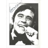 Norman Wisdom signed 8x6 b/w photo. Good Condition. All signed pieces come with a Certificate of