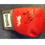 Lonsdale Boxing Glove signed by Marvellous Marvin Hagler. Good Condition. All signed pieces come