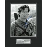 Bruce Campbell Evil Dead hand signed 14x11 Display. On offer is a beautiful hand signed mounted