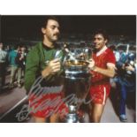 Bruce Grobbelaar signed 8x10 colour photo pictured celebrating with the European Cup. Good