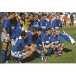 Autographed MEL STERLAND photo, a superb image depicting Rangers players celebrating with the League