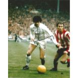 Peter Lorimer signed 10x8 colour photo pictured in action for Leeds United. Good Condition. All