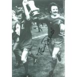 Tommy Smith signed 10x8 b/w photo pictured celebrating with the F.A Cup after Liverpools win in
