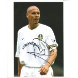 Rio Ferdinand Signed Leeds United 8x10 Photo. Good Condition. All signed pieces come with a