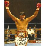 Johnny Nelson signed 10x8 colour photo pictured celebrating after defending his world