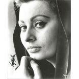 Sophia Loren signed 10x8 b/w photo. Good Condition. All signed pieces come with a Certificate of