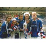 Autographed COLIN HENDRY photo, a superb image depicting Rangers players celebrating with the