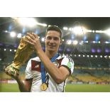 Julian Draxler signed 12x8 colour photo. German professional footballer who plays as a winger for