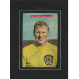 Football Tommy Younger signed colour magazine photo. Mounted to approx size 16x12. Good Condition.