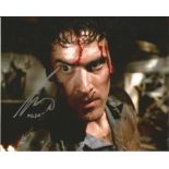 Bruce Campbell The Evil Dead hand signed 10x8 photo. This beautiful hand signed photo depicts