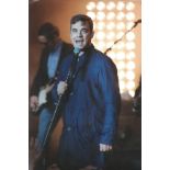 Music Robbie Williams 12x8 signed colour photo. Robert Peter Williams is an English singer-