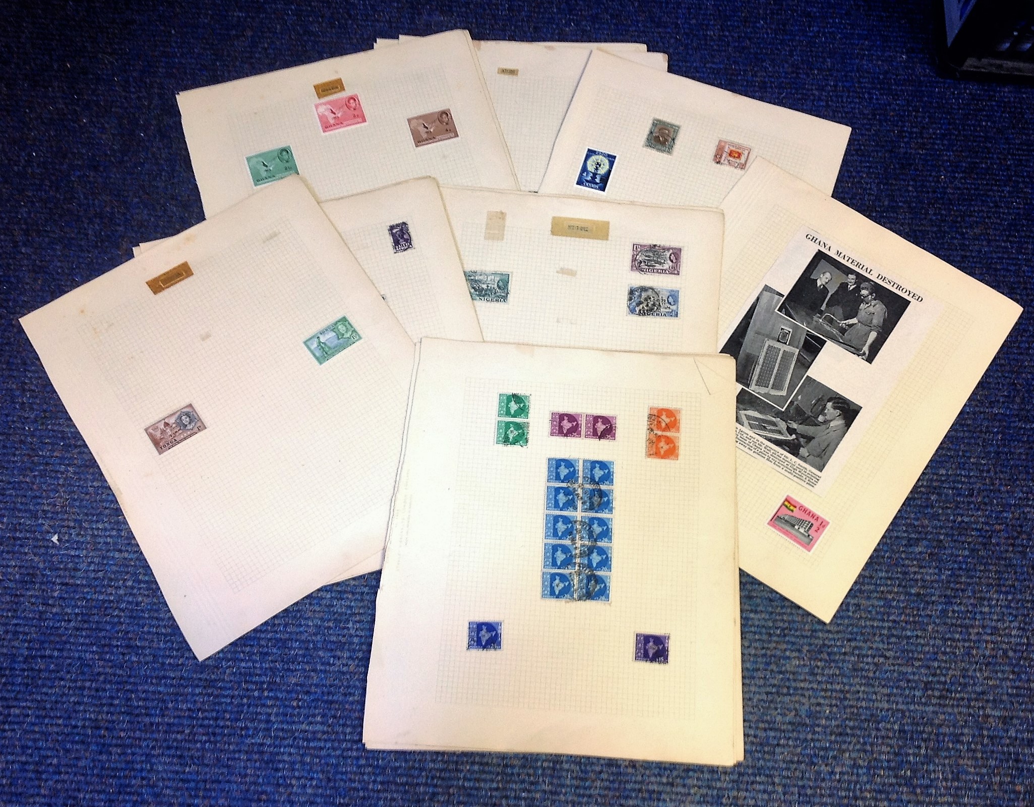 Collection of 70 British Commonwealth stamps on loose album pages. Includes Barbados, Aden,