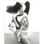 Foxes Louisa Allen genuine authentic signed 10x8 b/w photo. Good Condition. All signed pieces come