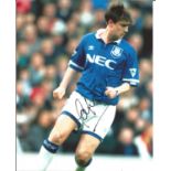 Ian Snodin signed 10x8 colour football photo pictured in action for Everton. Good Condition. All