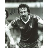 Frank Clark signed 10x8 b/w football photo pictured in action for Nottingham Forest. Good Condition.