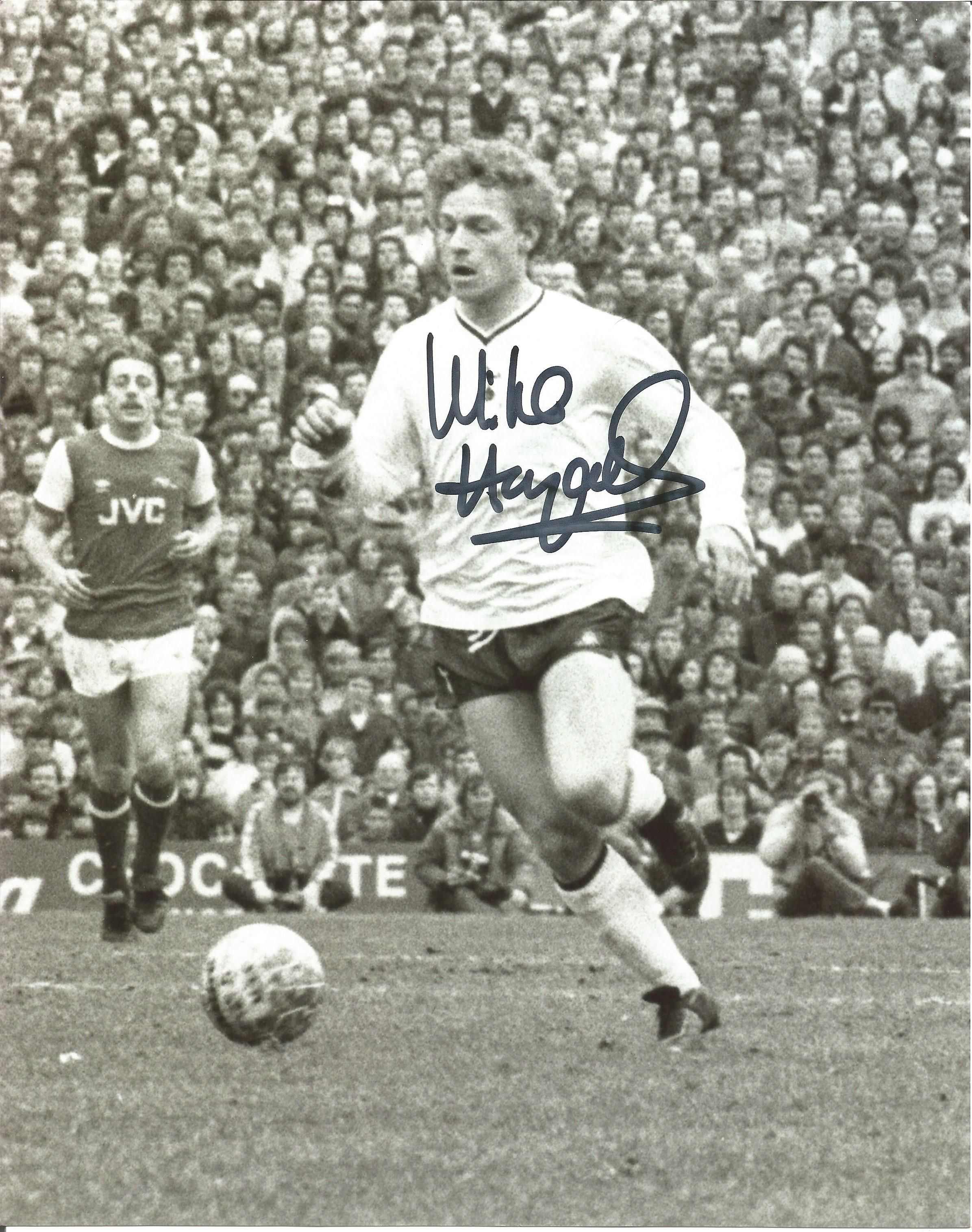 Mike Hazard signed 10x8 b/w football photo pictured in action for Tottenham Hotspur. Good Condition.