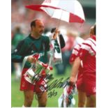 Bruce Grobbelaar signed 10x8 colour football photo pictured celebrating with the F.A Cup. Good