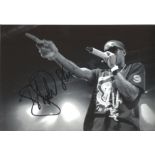 Tinchy Stryder 8x10 signed b/w photograph British rap artist. Good Condition. All signed pieces come