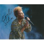 Emeli Sande Singer Signed 8x10 Photo. Good Condition. All signed pieces come with a Certificate of