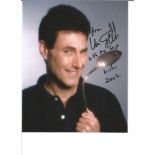 Uri Geller signed 10x8 colour photo. Dedication removed. Good Condition. All signed pieces come with