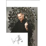 Uri Geller signed white card with 10x8 colour photo. Good Condition. All signed pieces come with a