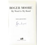 Roger Moore signed My Word is My Bond hardback book. Signed on inside title page. Good Condition.