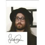 Sean Lennon signed white card with 10x8 colour photo. Good Condition. All signed pieces come with