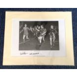 Alex Stepney and Pat Crerand signed black and white photo. Mounted to approx 18x14. Good