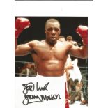 Frank Bruno signed white card with 10x8 colour photo. Good Condition. All signed pieces come with