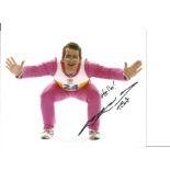 Eddie The Eagle Edwards 10x8 Signed Colour Photo. Good Condition. All signed pieces come with a