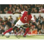 Kolo Toure Signed Arsenal 8x10 Photo. Good Condition. All signed pieces come with a Certificate of