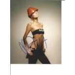 Paris Hilton signed 10x8 colour photo shoot picture. Good Condition. All signed pieces come with a