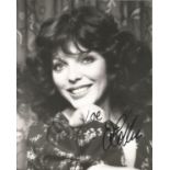 Joan Collins signed 10x8 black and white photo. Slightly smudged signature. Good Condition. All